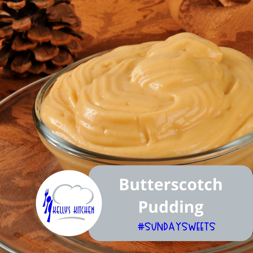 A glass bowl with a pinecone next to it, and in the bowl is a Carmel-colored paste, butterscotch pudding.